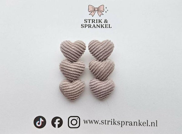 Haarspeldje hartjes beige geribbeld