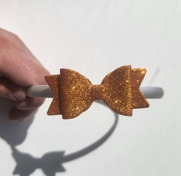 Diadeem oranje glitter strik