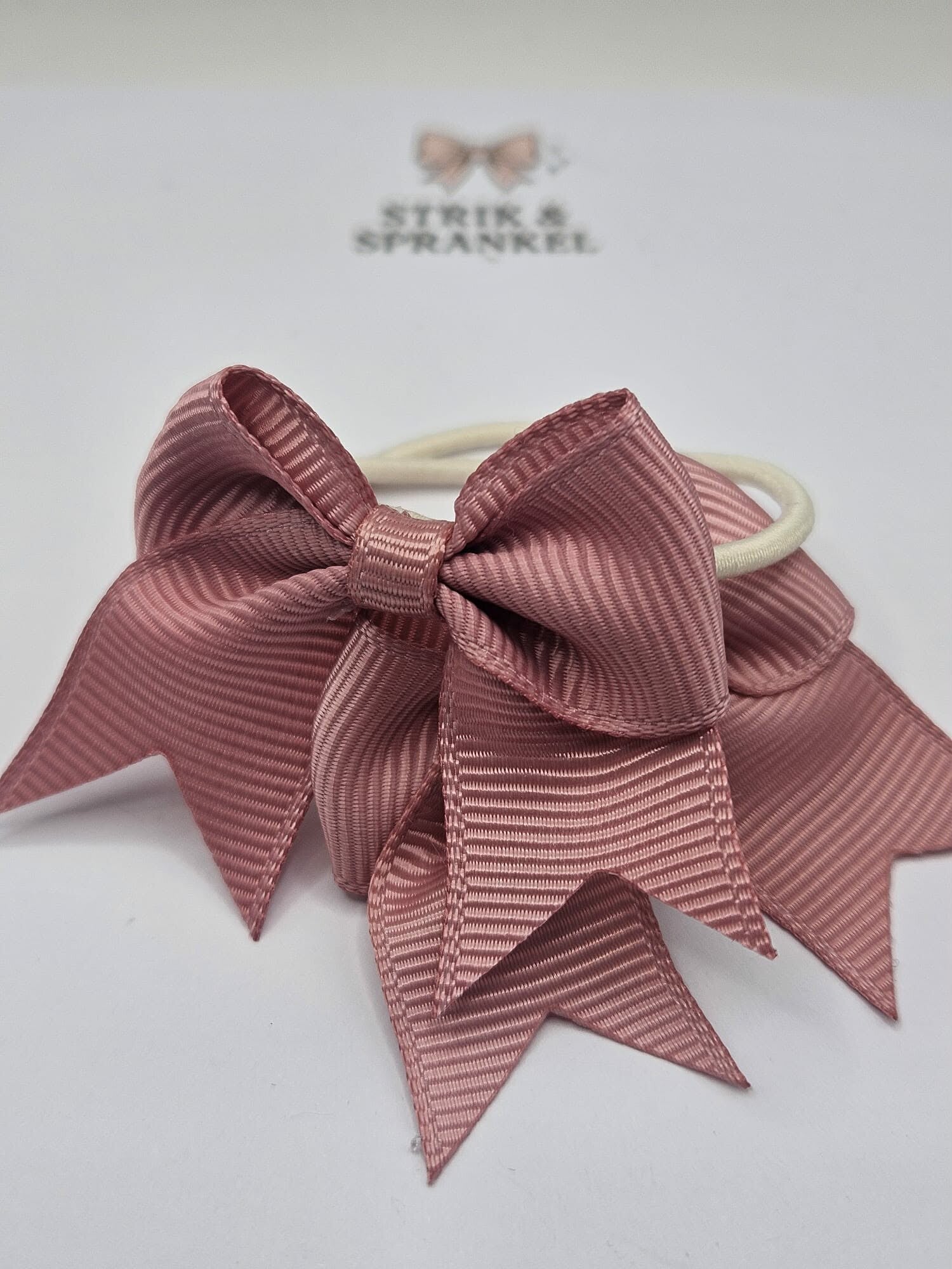 Haarelastiek roze strik