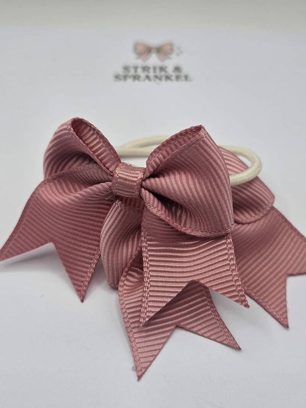 Haarelastiek roze strik