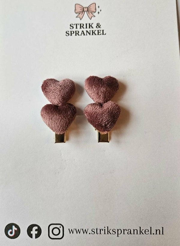 Haarspeldje twee hartjes donker roze