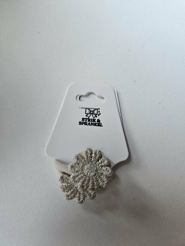 Haarelastiekje goud/zilver bloem