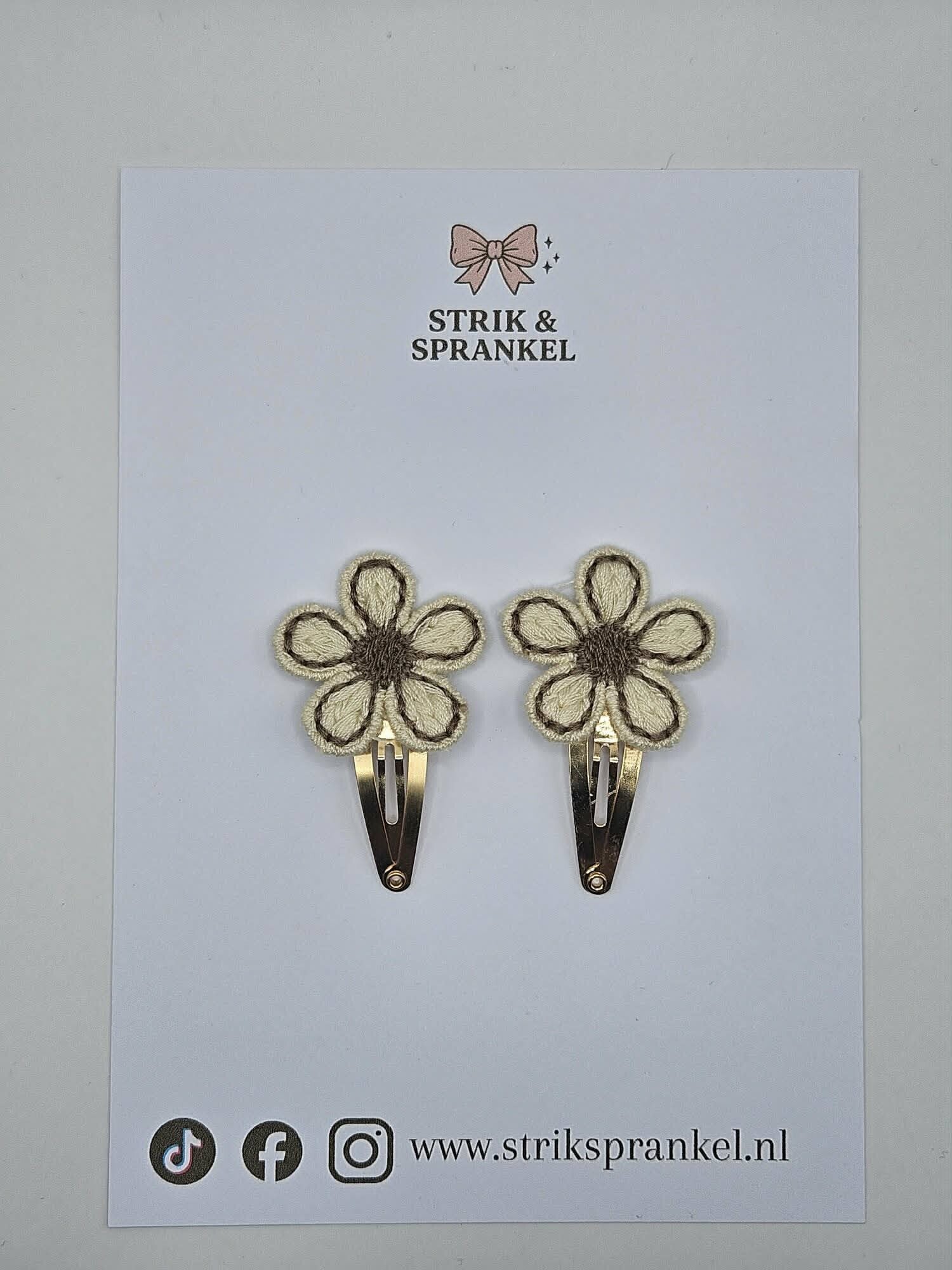 Haarspeldje Bruin/creme bloem