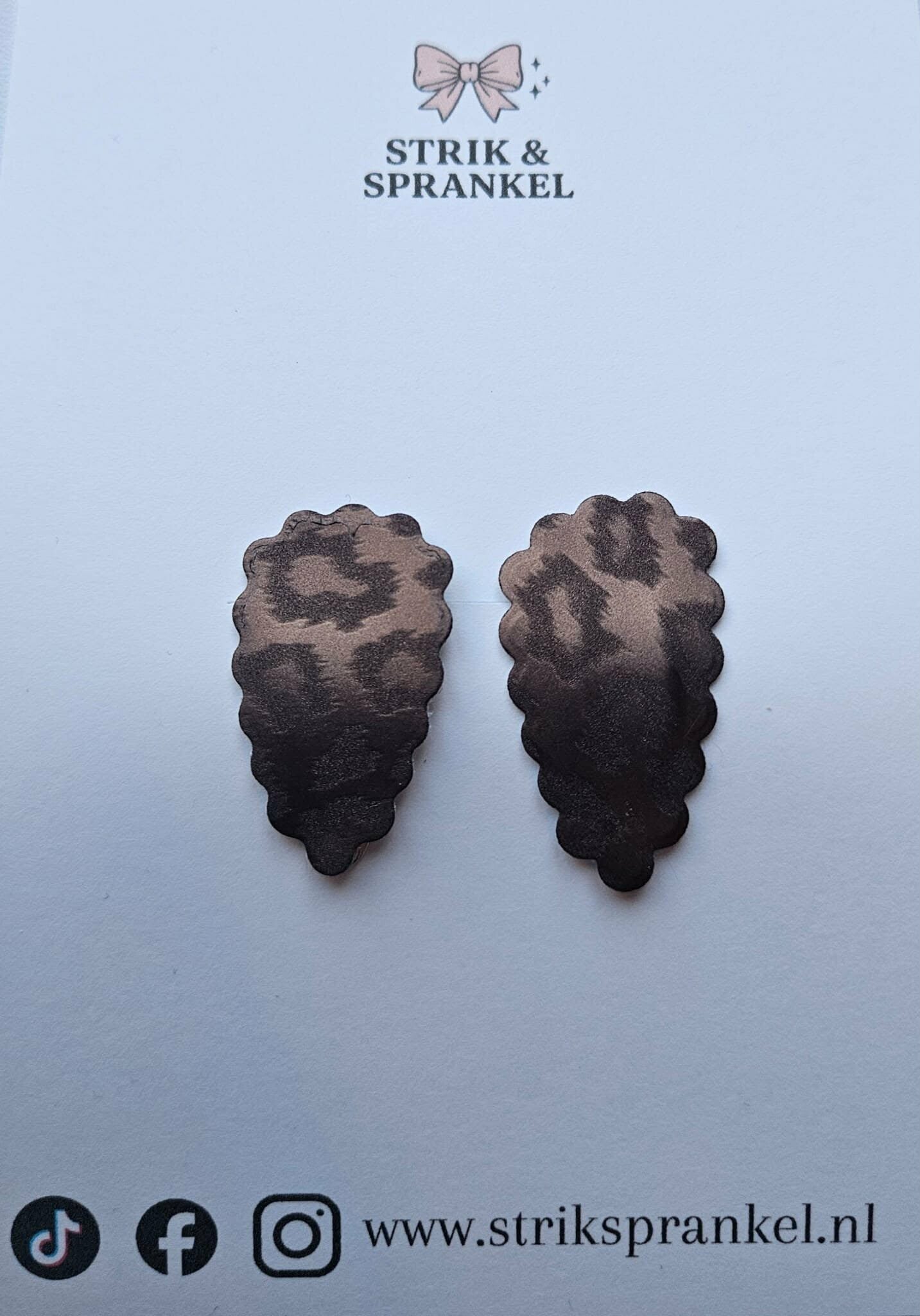 Haarspeldje bruintinten gekarteld