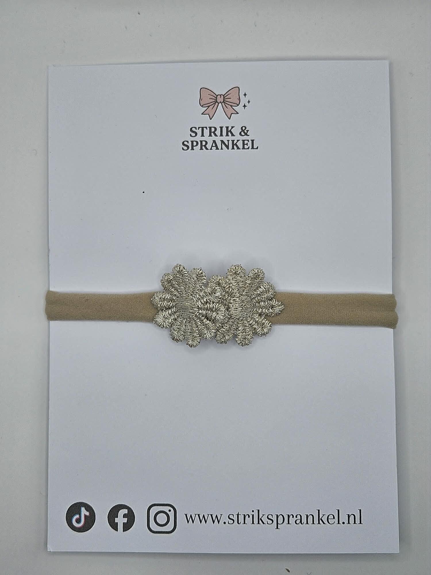 Baby haarbandje goud/zilver bloem