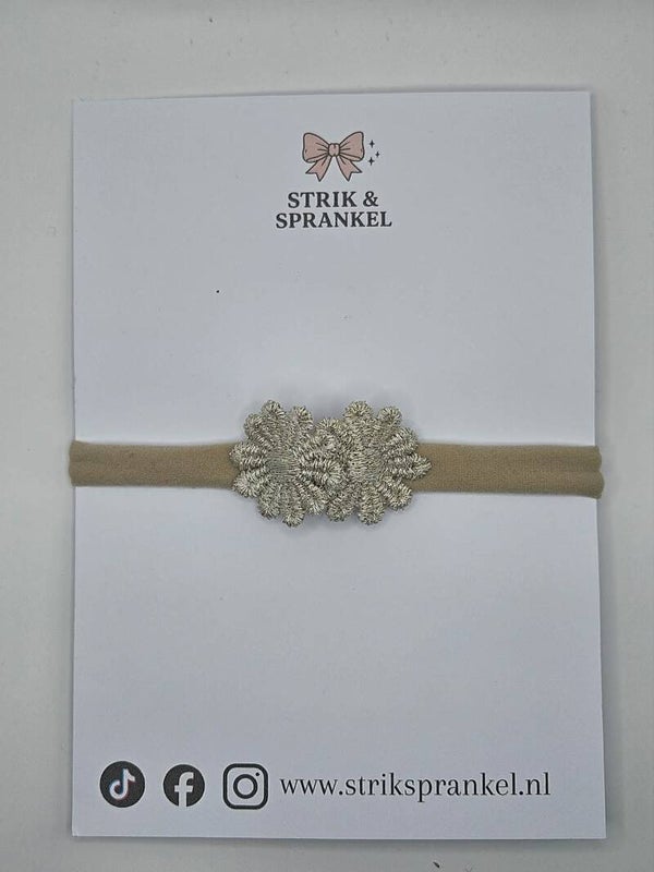 Baby haarbandje goud/zilver bloem