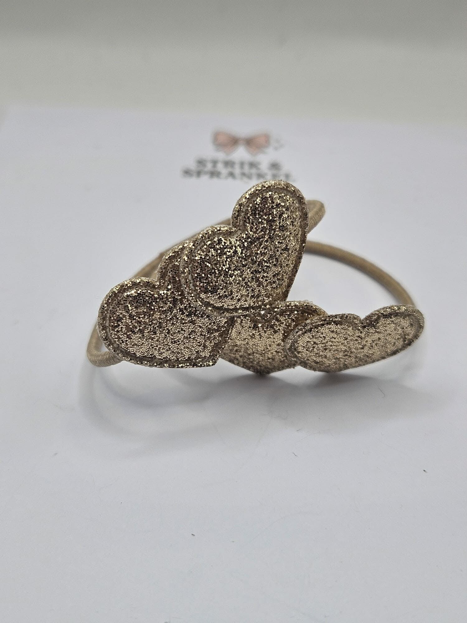 Haarelastiek gouden hartjes