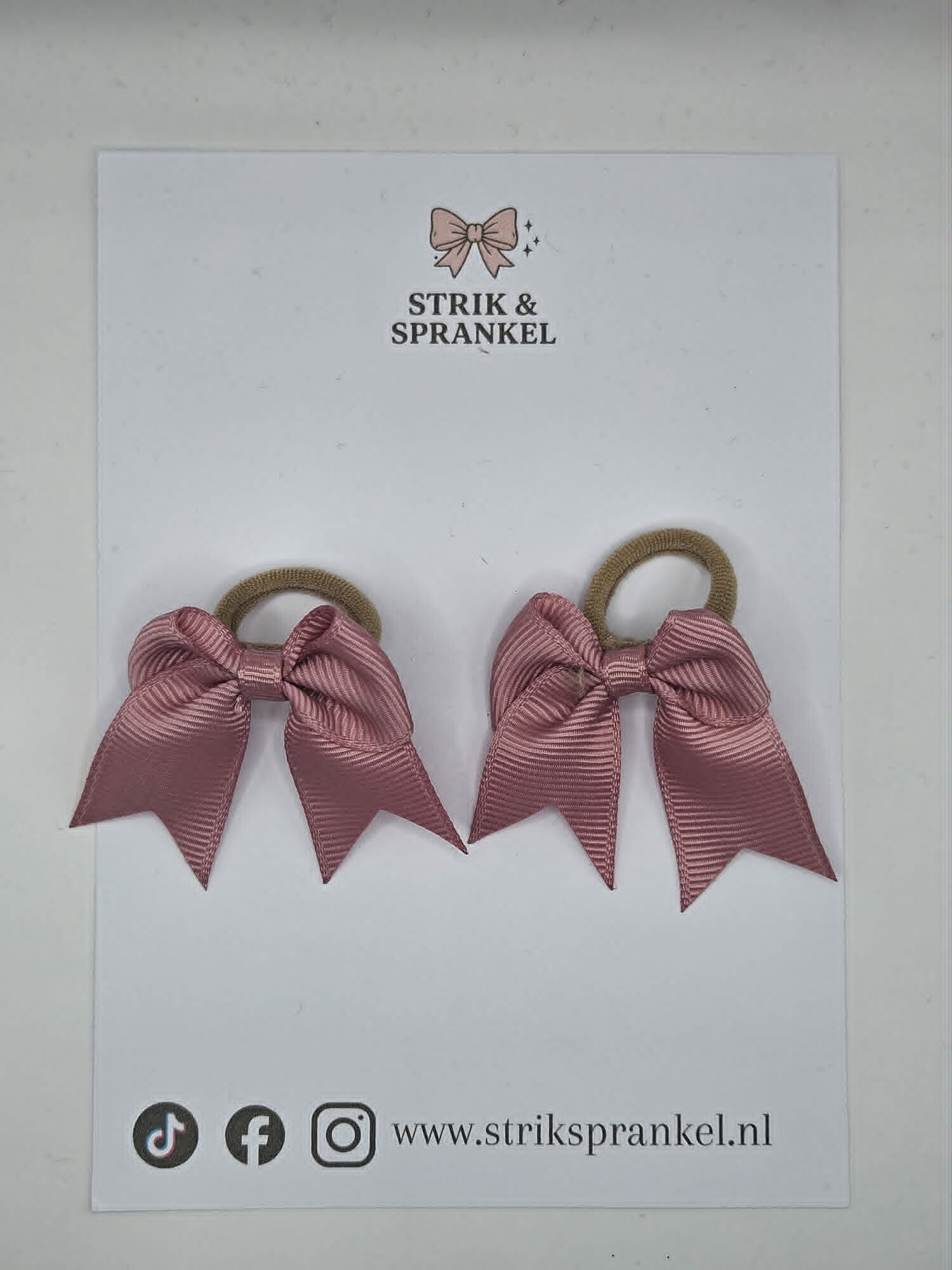 Haarelastiek roze strikjes