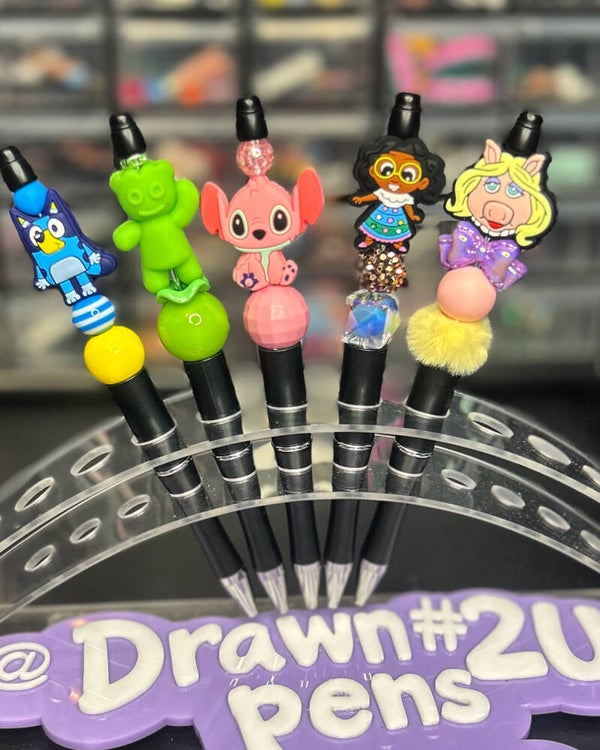 Bluey, stitch, Mrs piggy, enchanto, sour patch