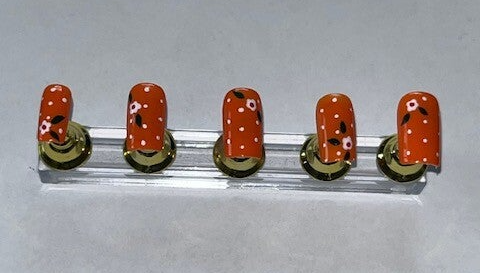 Orange à pois blanc