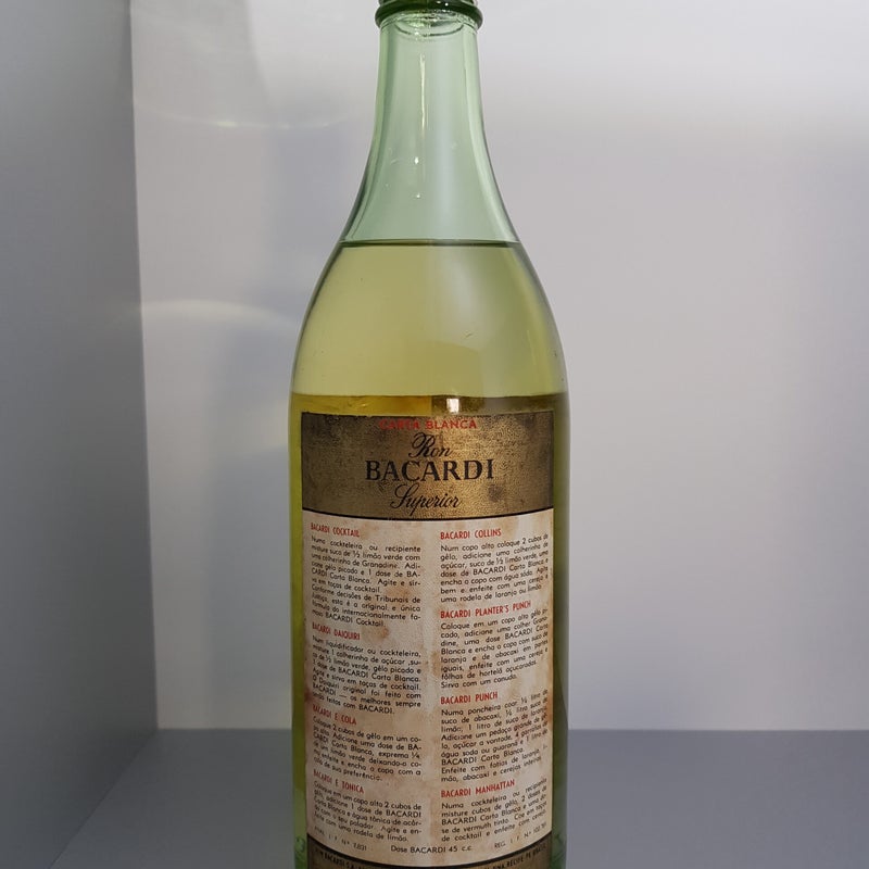 Bacardi Carta Blanca. 1 litre (label), 980ml (bottom), 946ml bottom front bottle). Production year 1984