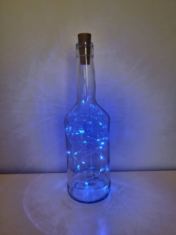 Botella de luces