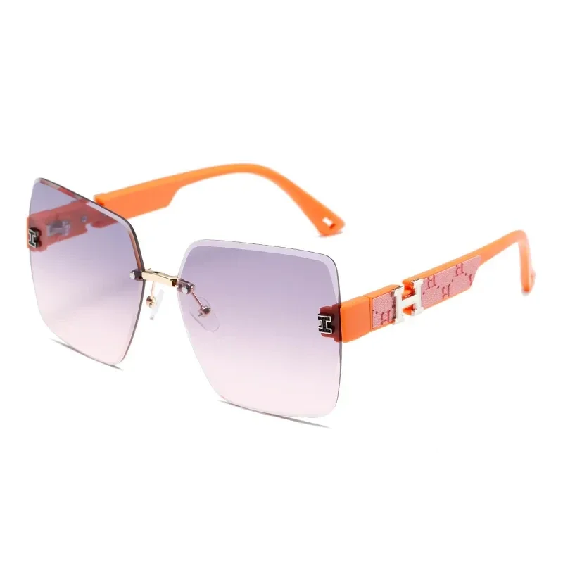 Lunettes de Soleil H Avec Etui En Cuir