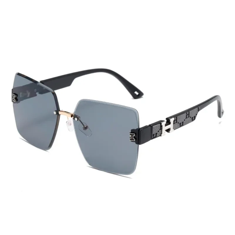 Lunettes de Soleil H Avec Etui En Cuir