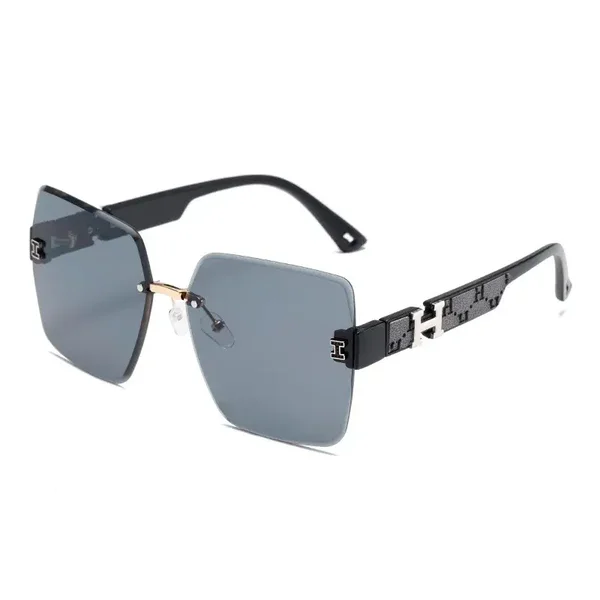 Lunettes de Soleil H Avec Etui En Cuir