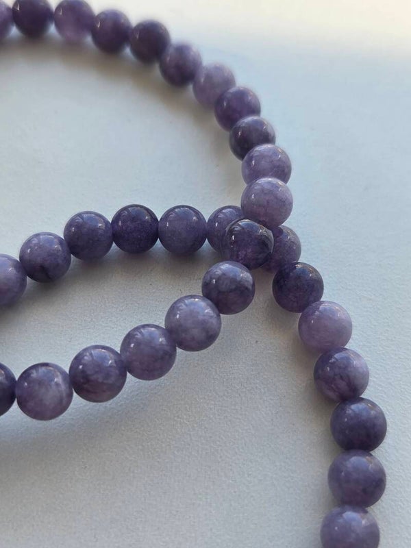 Bracelet en Charoïte – Pierre de transformation, de protection et de sérénité intérieure