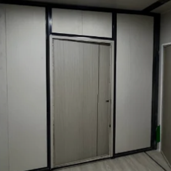 sliding door with a grey  wood-grain within a black aluminum frame_05