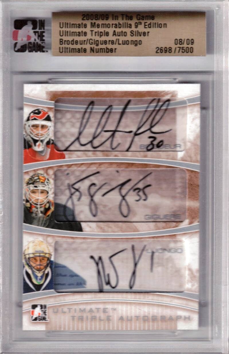 ultimatememorabiliatripleautographwithluongogiguere9jpg.jpg