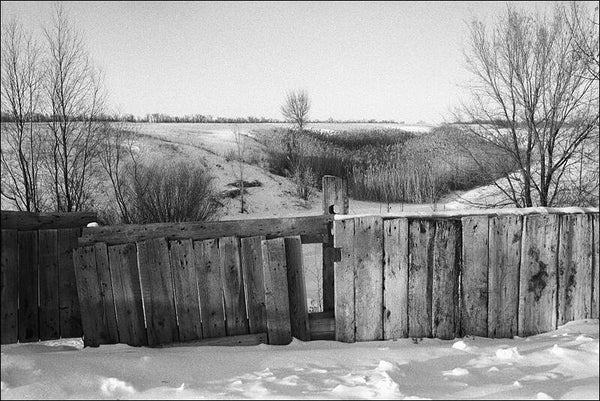 Behind a village fence