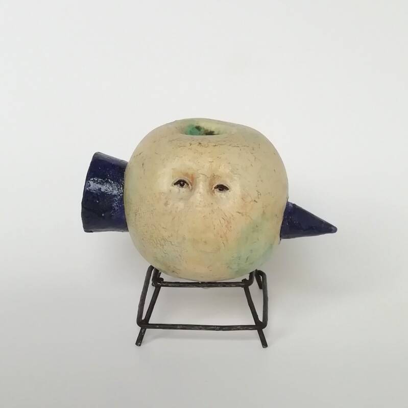 Cone though stone on stool. Ceramics, oxides, glazing, metal stool, 8x15x13 cm, 2021.  € 250