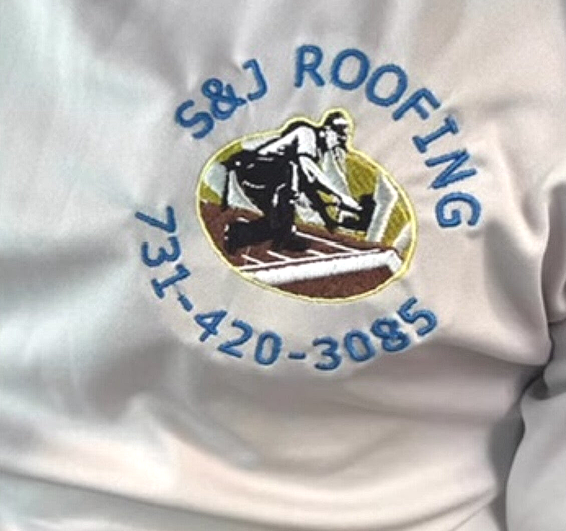 S&J Roofing logo embroidered on the left chest of a white shirt
