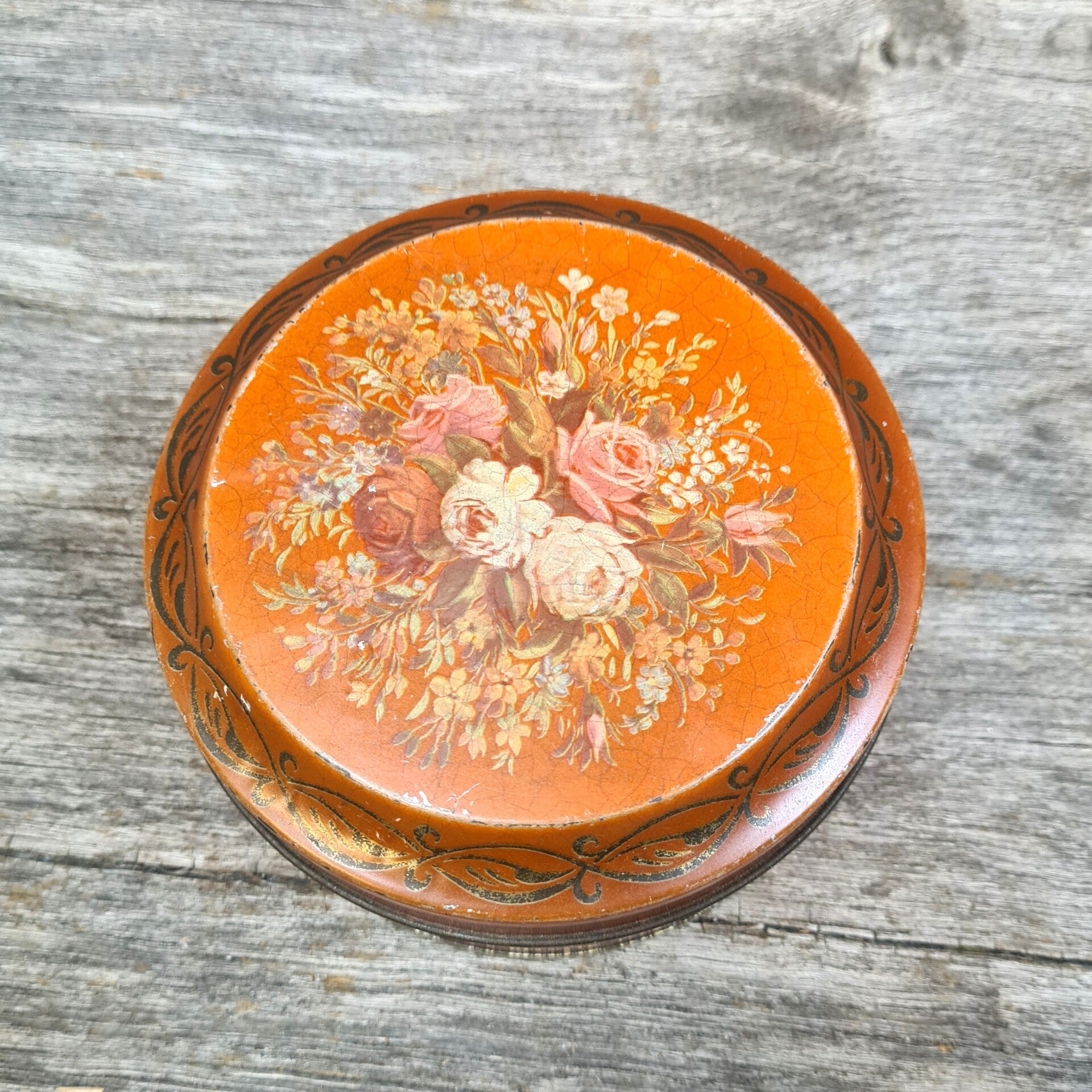 Brocante blik met rozendecor