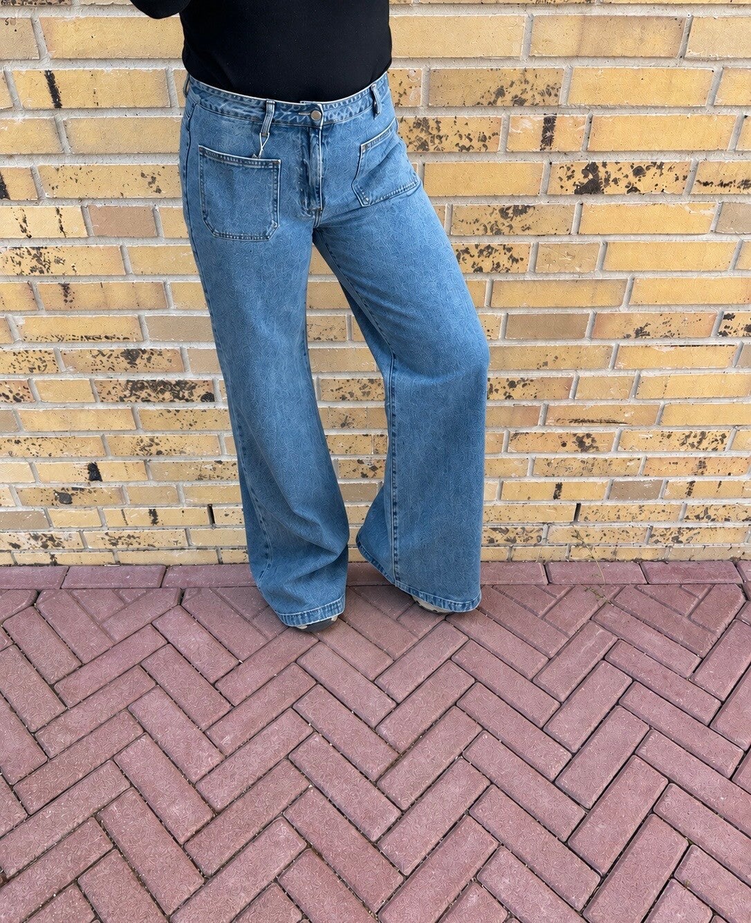 Mid blue wide leg jeans met zakken