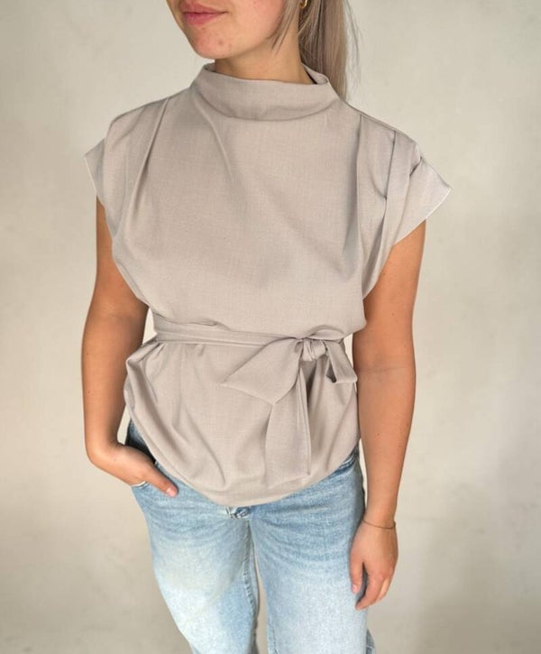 Chique taupe top met strikdetail