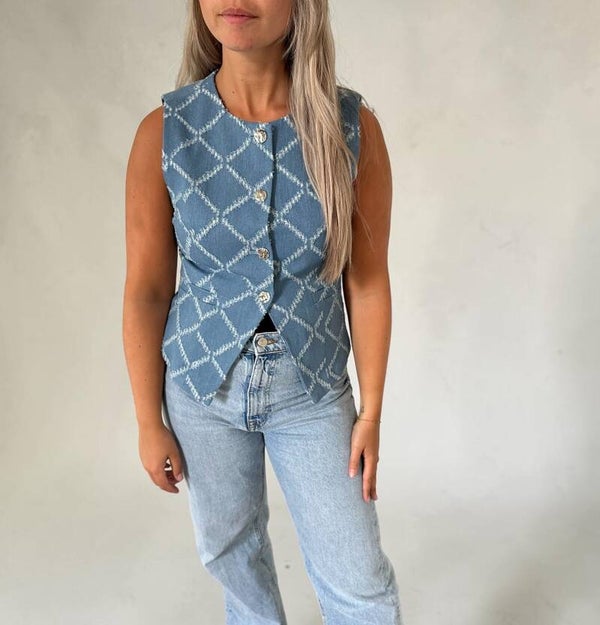 Lichtblauw denim gilet met zilveren knopen