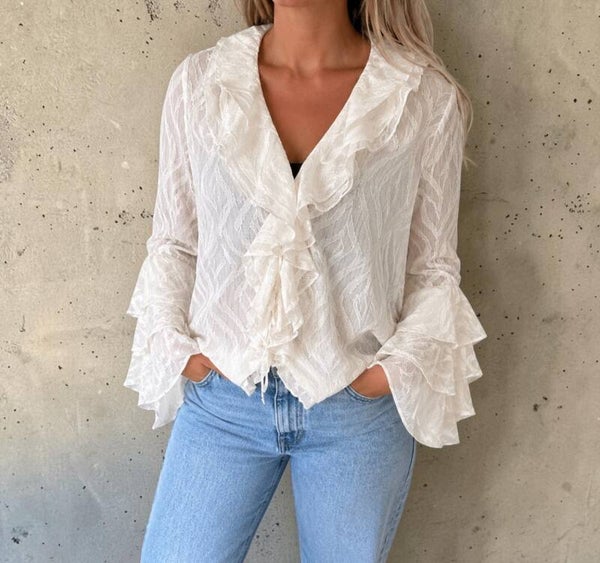 Crème blouse met ruches en strikdetail