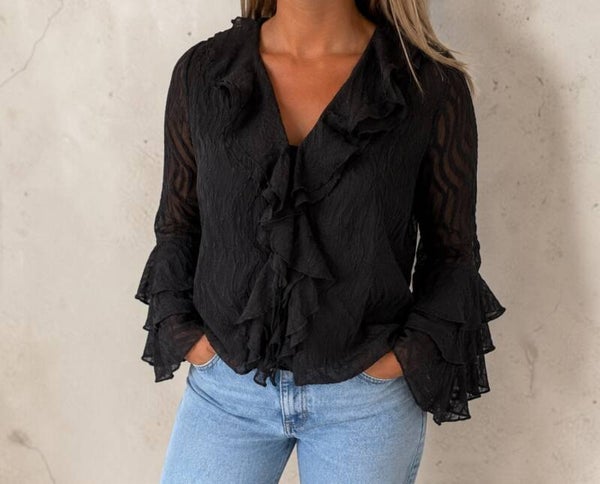 Zwarte blouse met ruches en strikdetail