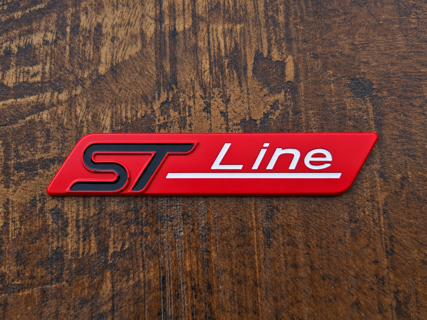 ST-line rood/zwart embleem