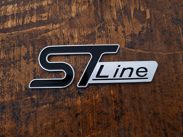 ST-line zwart/chroom grill embleem