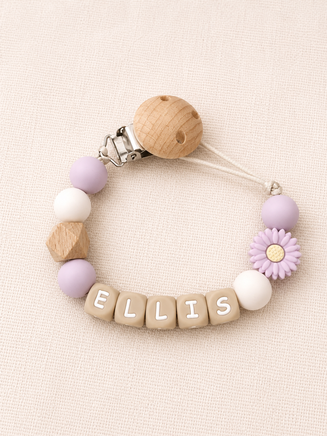 Gepersonaliseerd Speenkoord met naam | paars en beige met bloem