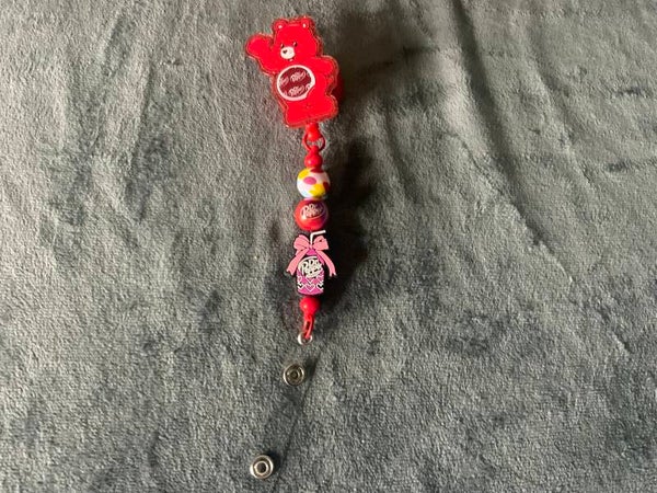 Dr. Pepper Care Bear badge reel
