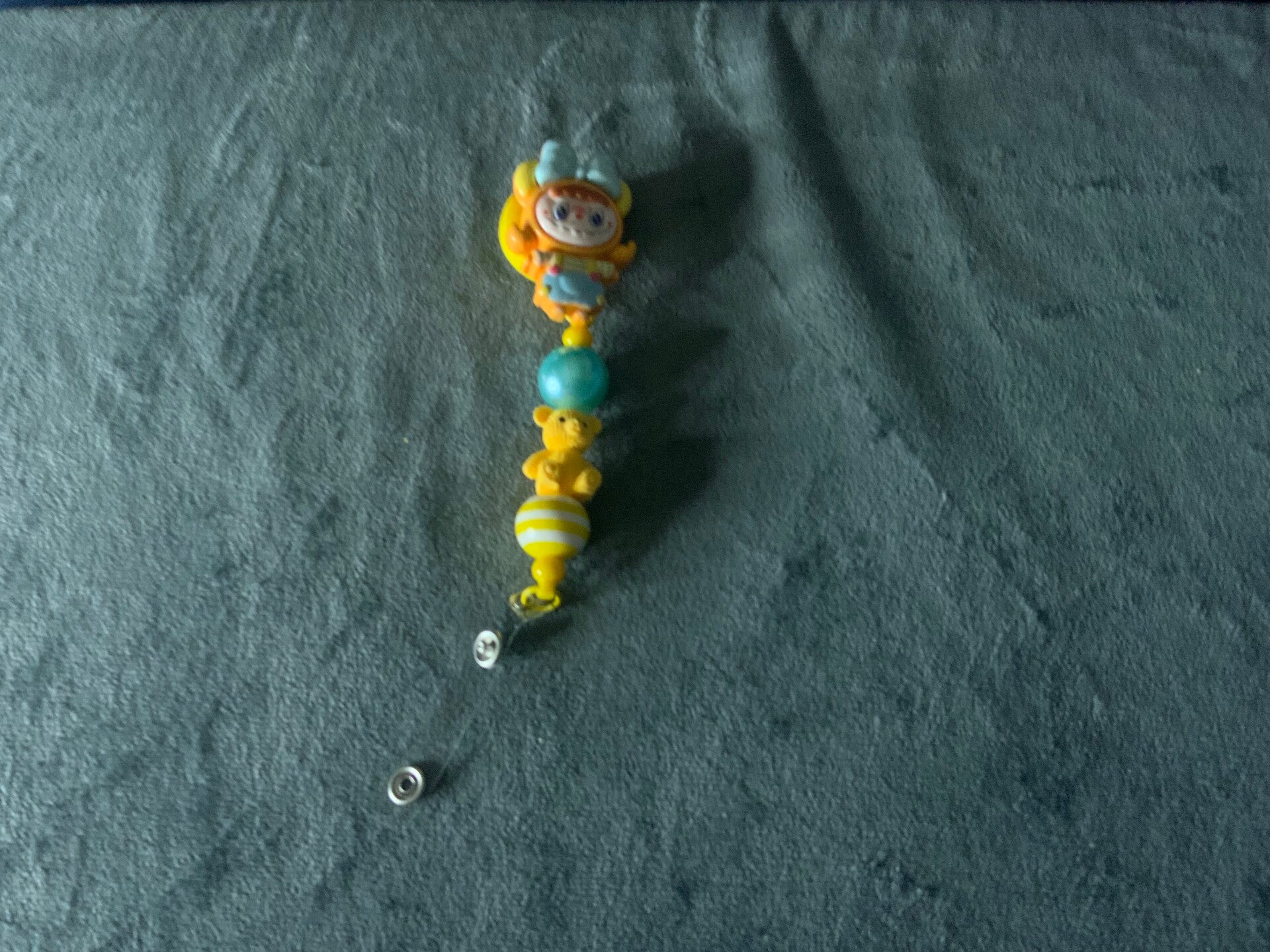 Yellow Labubu beaded badge reel