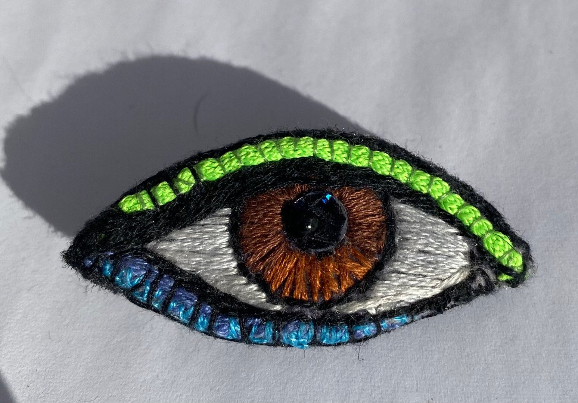 Eye brooch