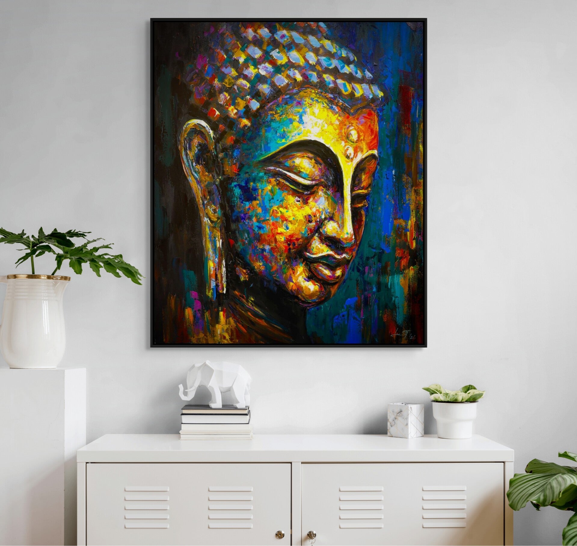 Boeddha schilderij Contemplation in modern interieur boven wit kastje met olifant en plant – handgeschilderd in Thailand