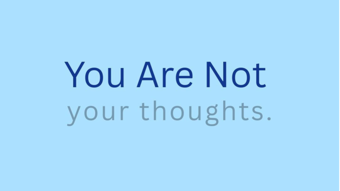 text you are not your thoughts on plain blue background