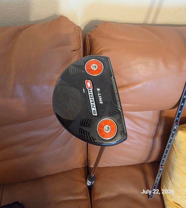 Used Odyssey O works R-Line putter; plays 33.5"; Grip feels like new-No headcover