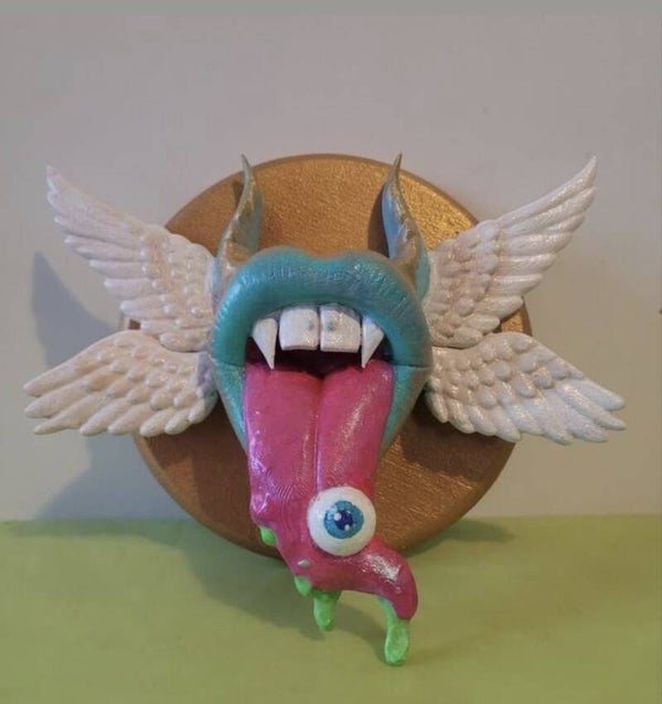 Pretty Parasites Surreal mouth with wings