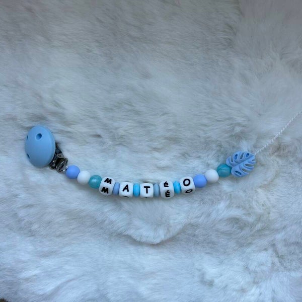 Attache tétine feuille bleue