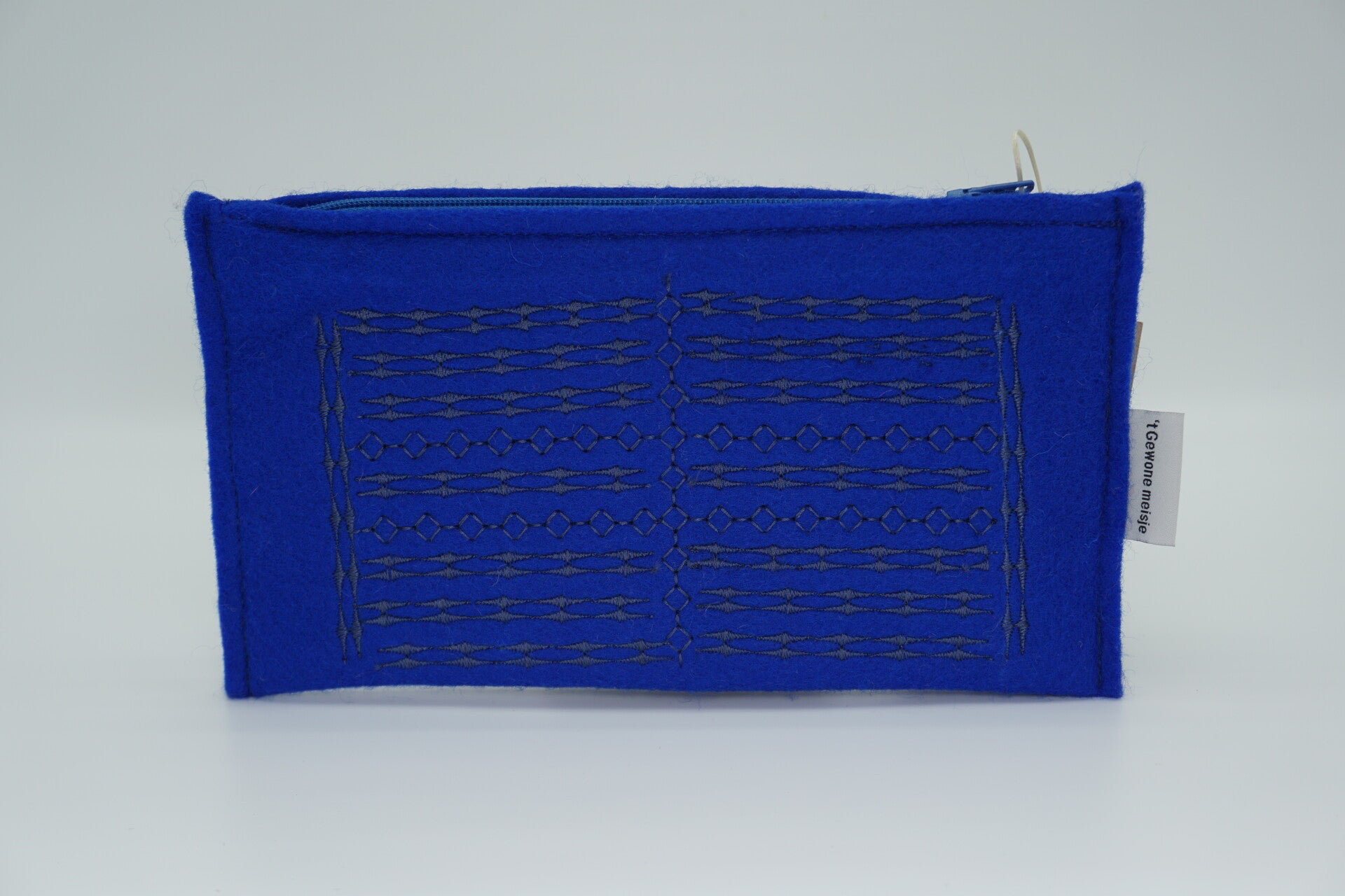 Blauw etui van wolvilt met siersteken