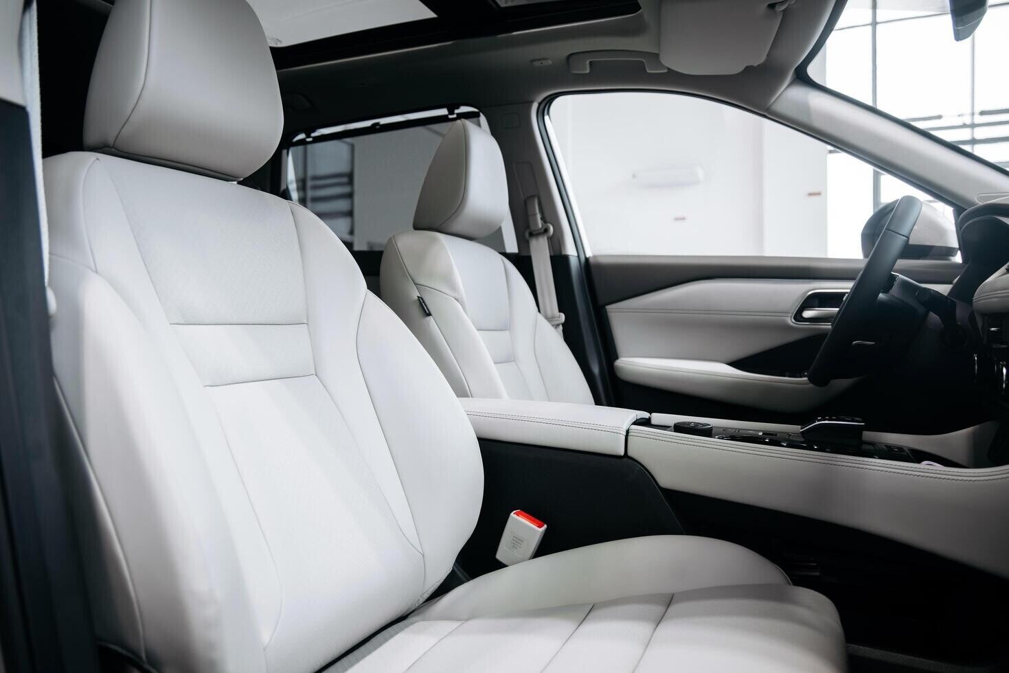 modern-automotive-interior-featuring-luxurious-white-leather-seats-and-advanced-smart-driving-interface-showcasing-a-sleek-design-in-a-contemporary-vehicle-cabin-free-photo-standard.jpg