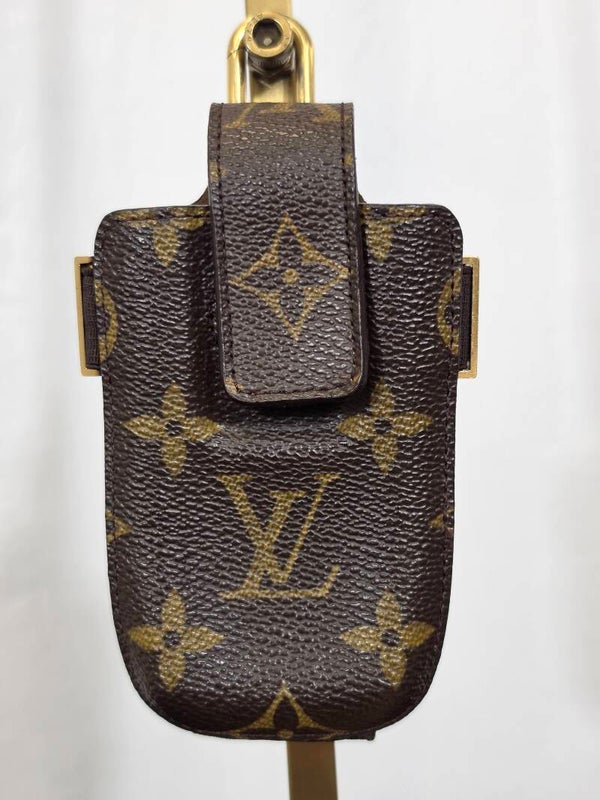 LOUIS VUITTON ÉTUI TÉLÉPHONE INTERNATIONAL MONOGRAM