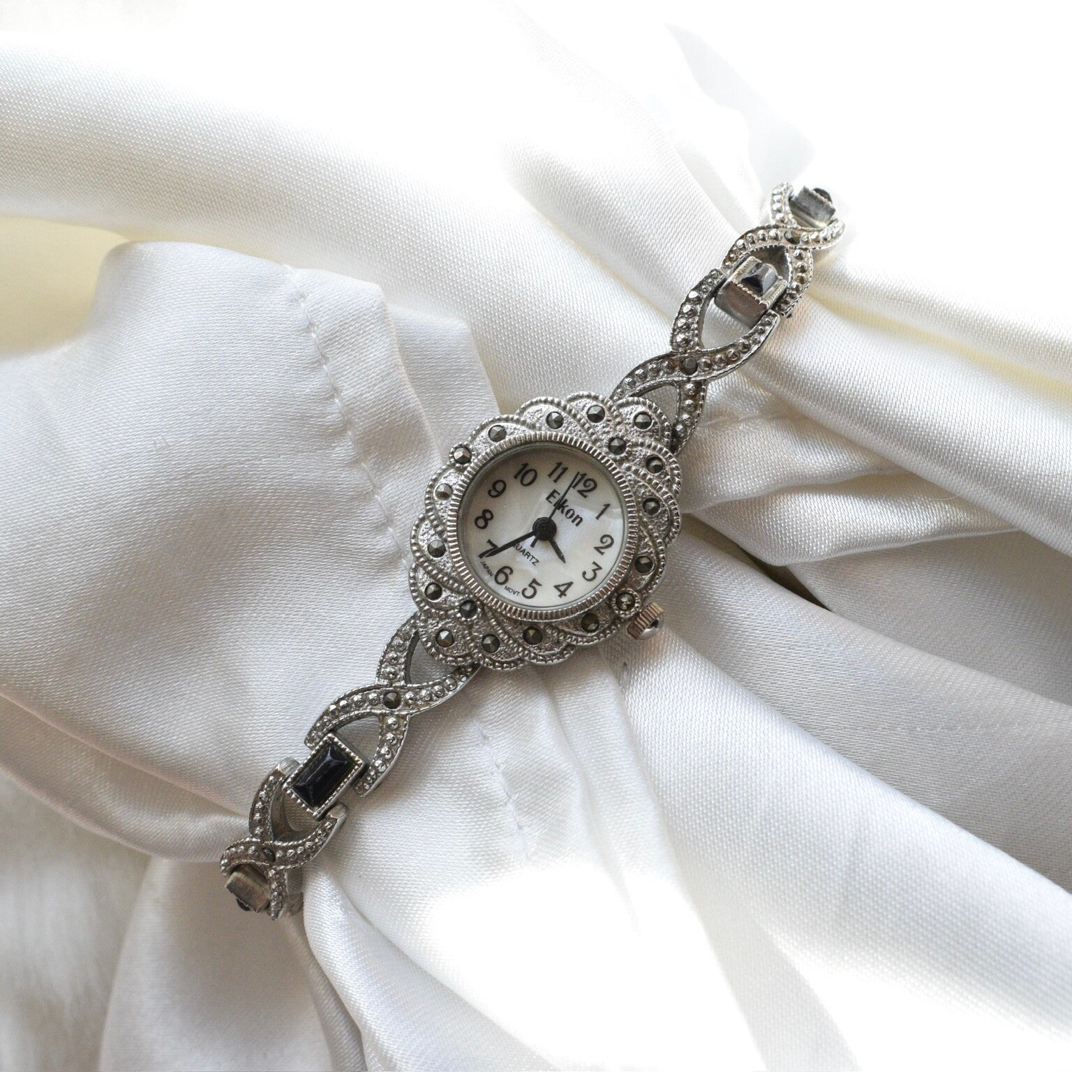 Eikon 7/7.5” ticking silver watch