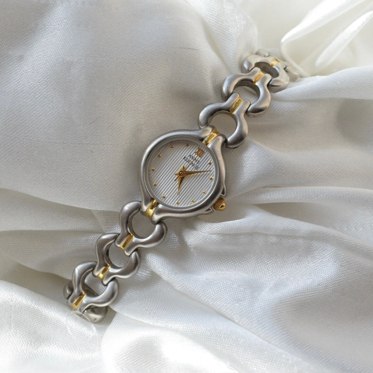 Anne Klein 7” ticking two toned watch