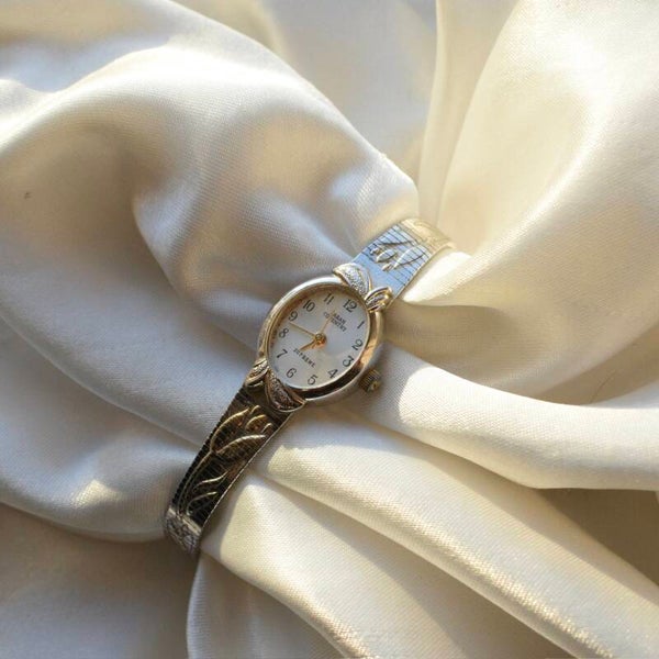 Sarah Coventry 4-7.75” ticking silver watch