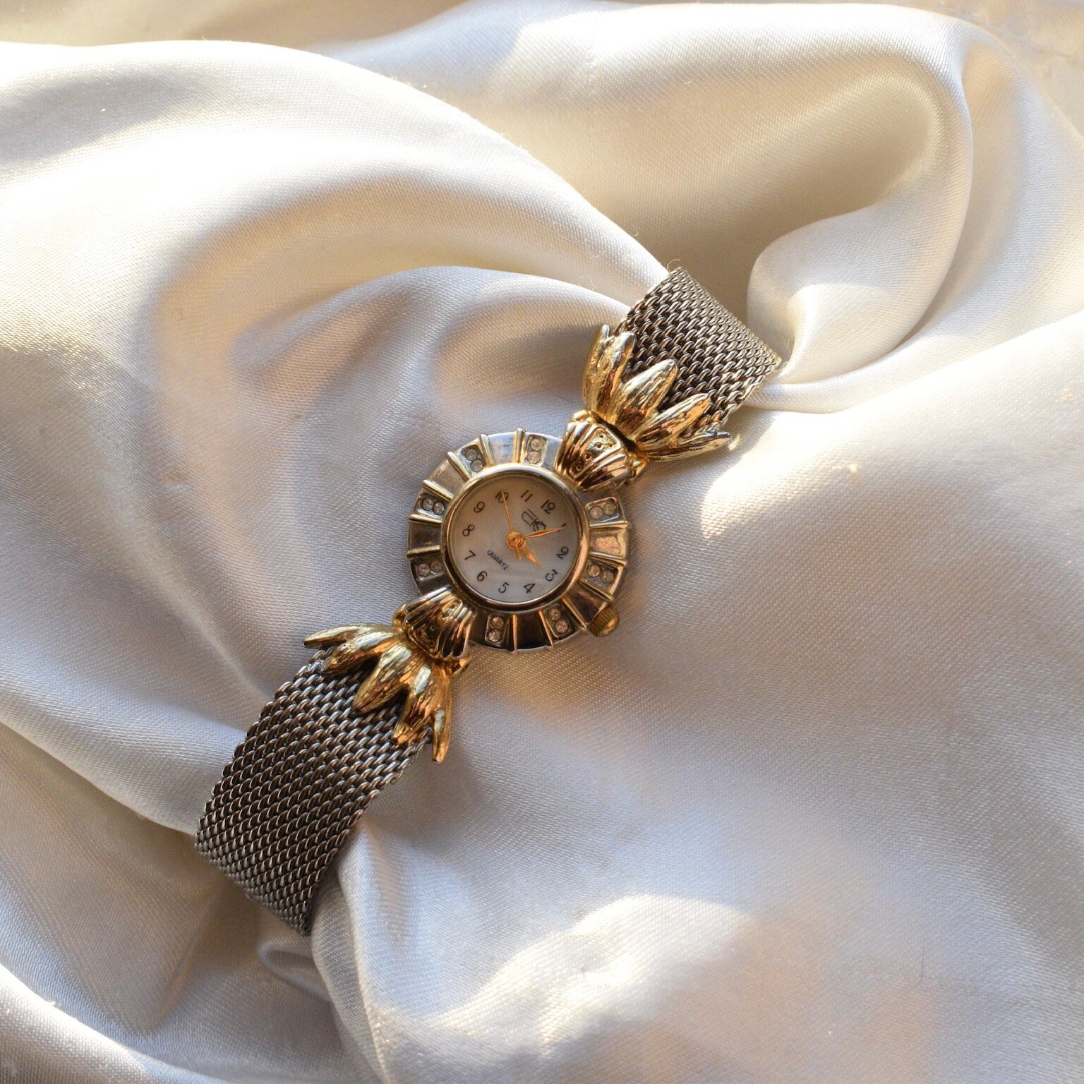 7.75” ticking two toned 7.75” watch