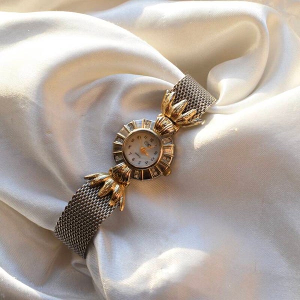 7.75” ticking two toned 7.75” watch